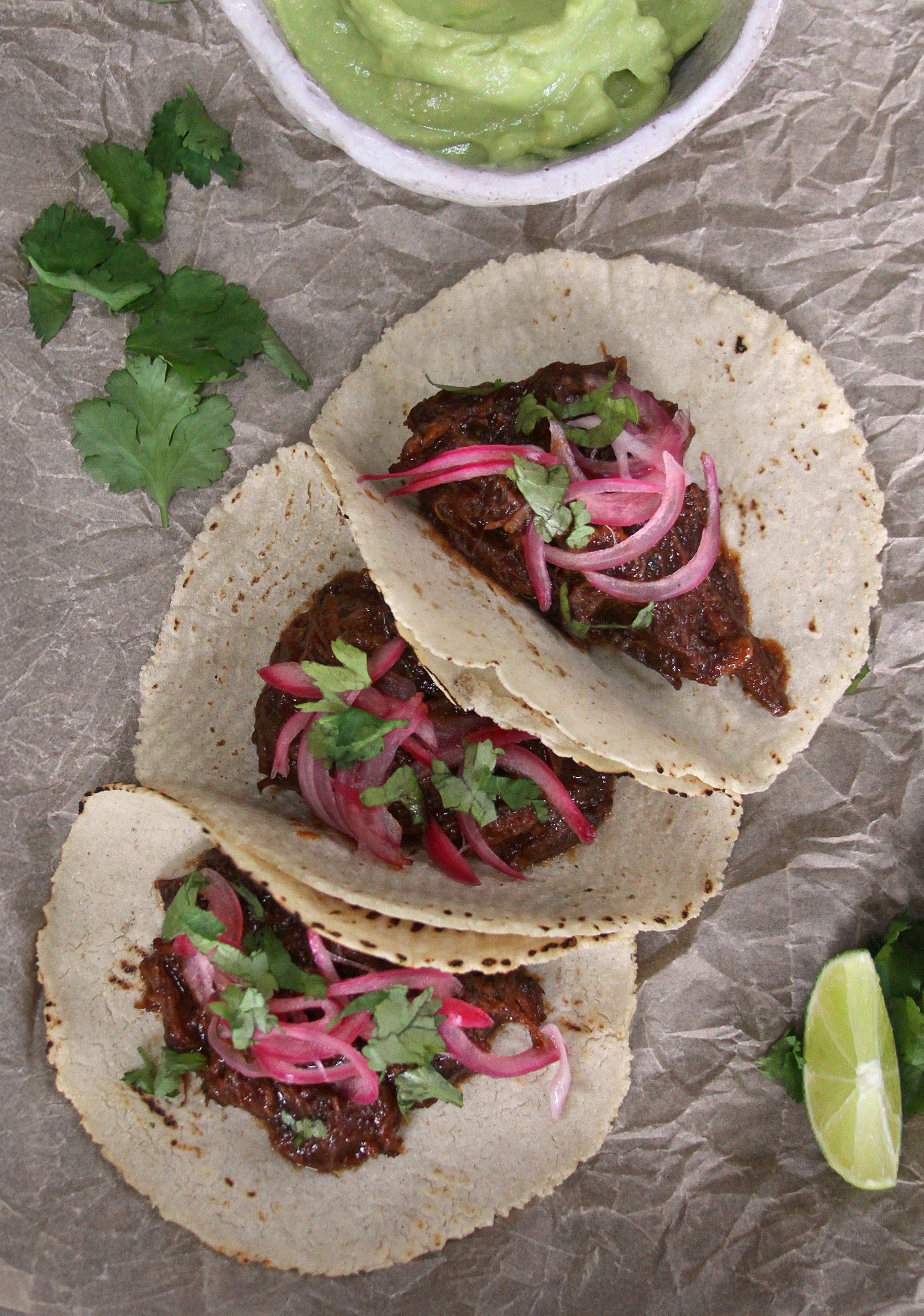 Three ancho chilli pork cheek carnitas
